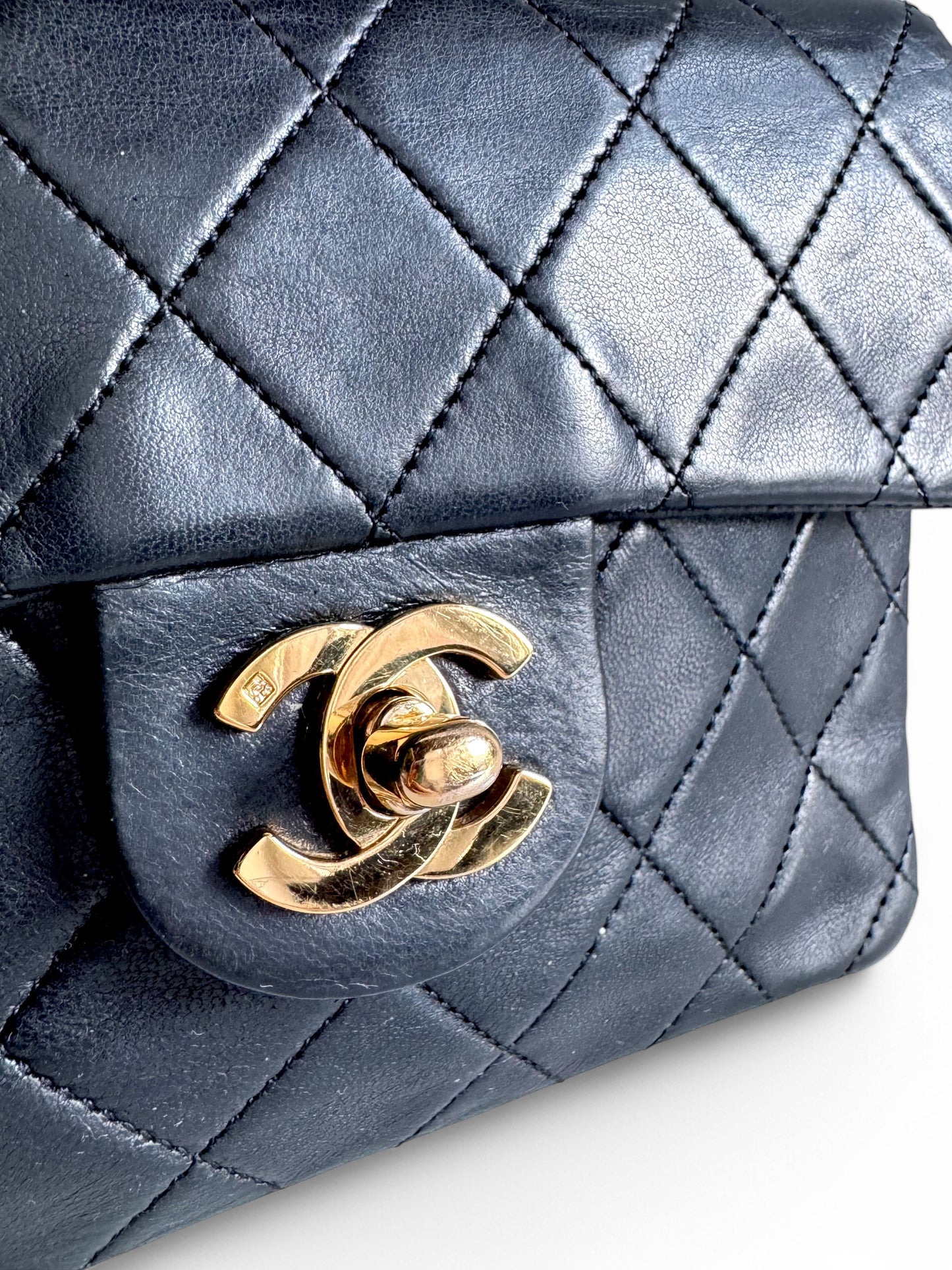 CHANEL Lambskin Quilted Mini Flap Bag