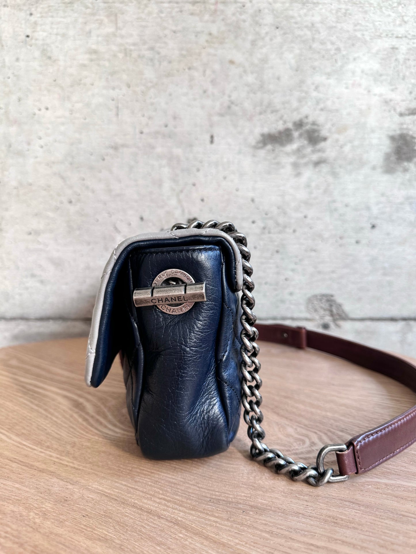 CHANEL
Iridescent Calfskin Tri-Color Country Chic Flap