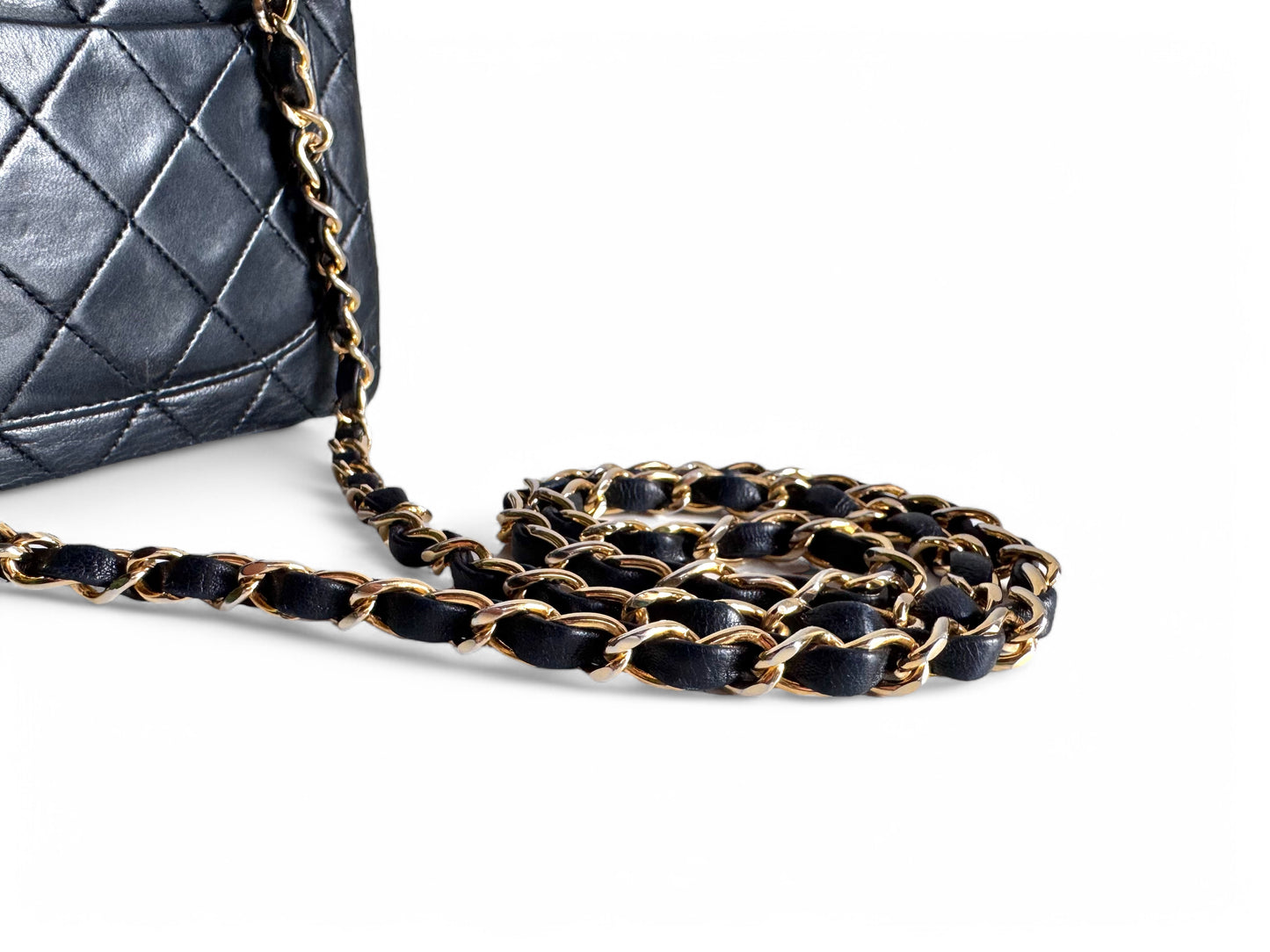 CHANEL Lambskin Quilted Mini Flap Bag