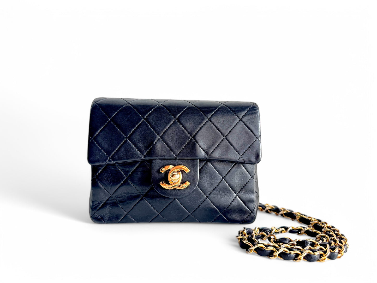 CHANEL Lambskin Quilted Mini Flap Bag