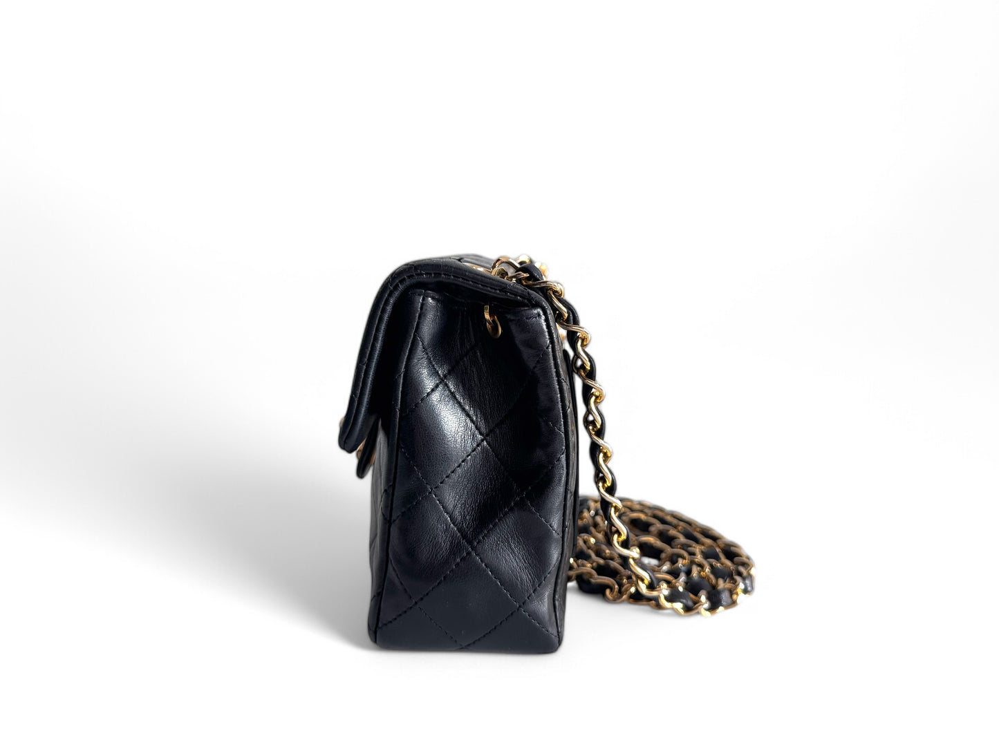 CHANEL Lambskin Quilted Mini Flap Bag