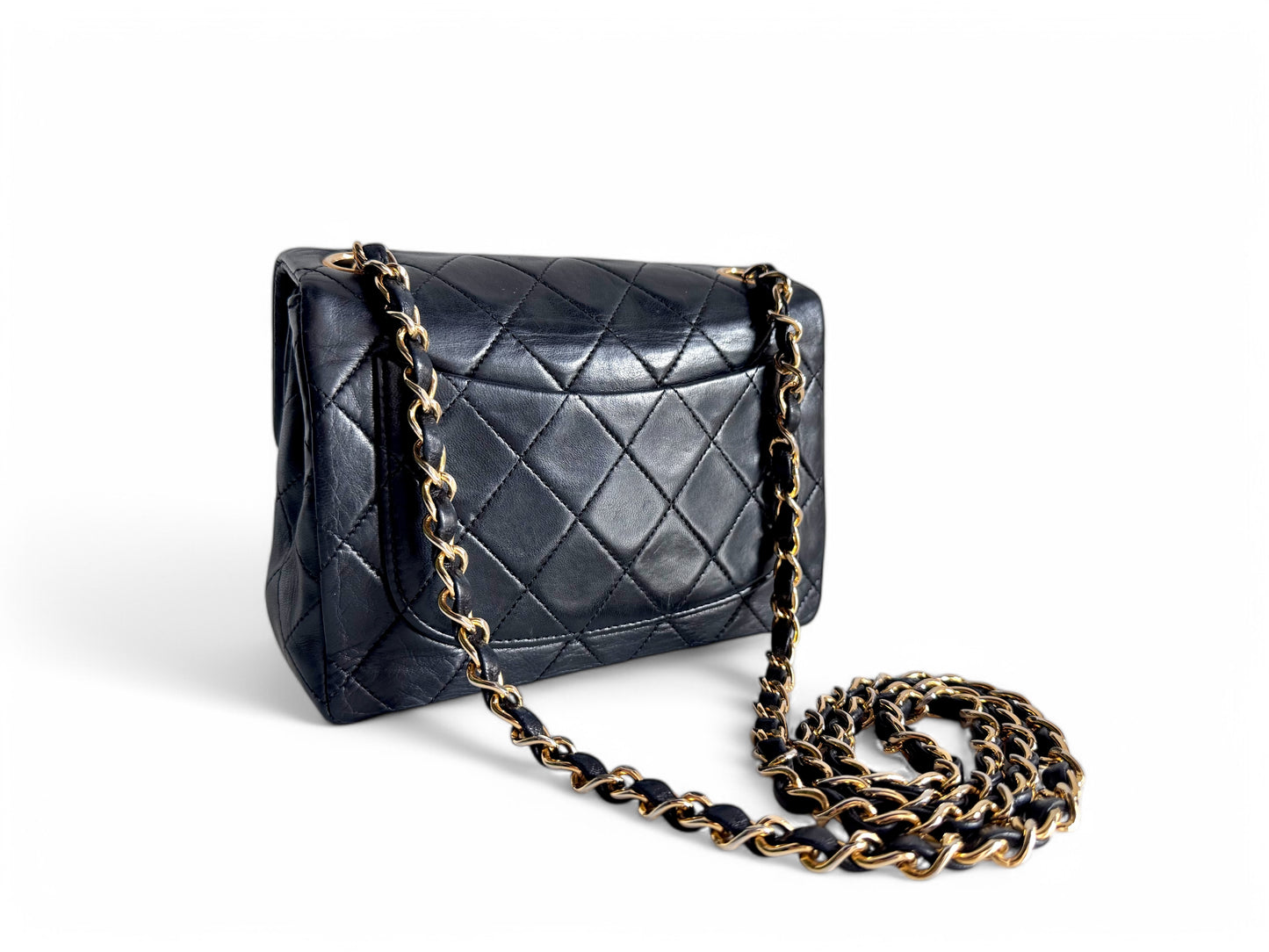 CHANEL Lambskin Quilted Mini Flap Bag