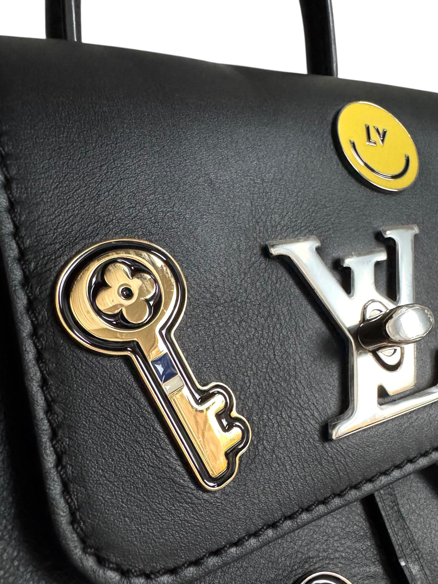 LOUIS VUITTON My Lockme Mini Pins Leather Backpack