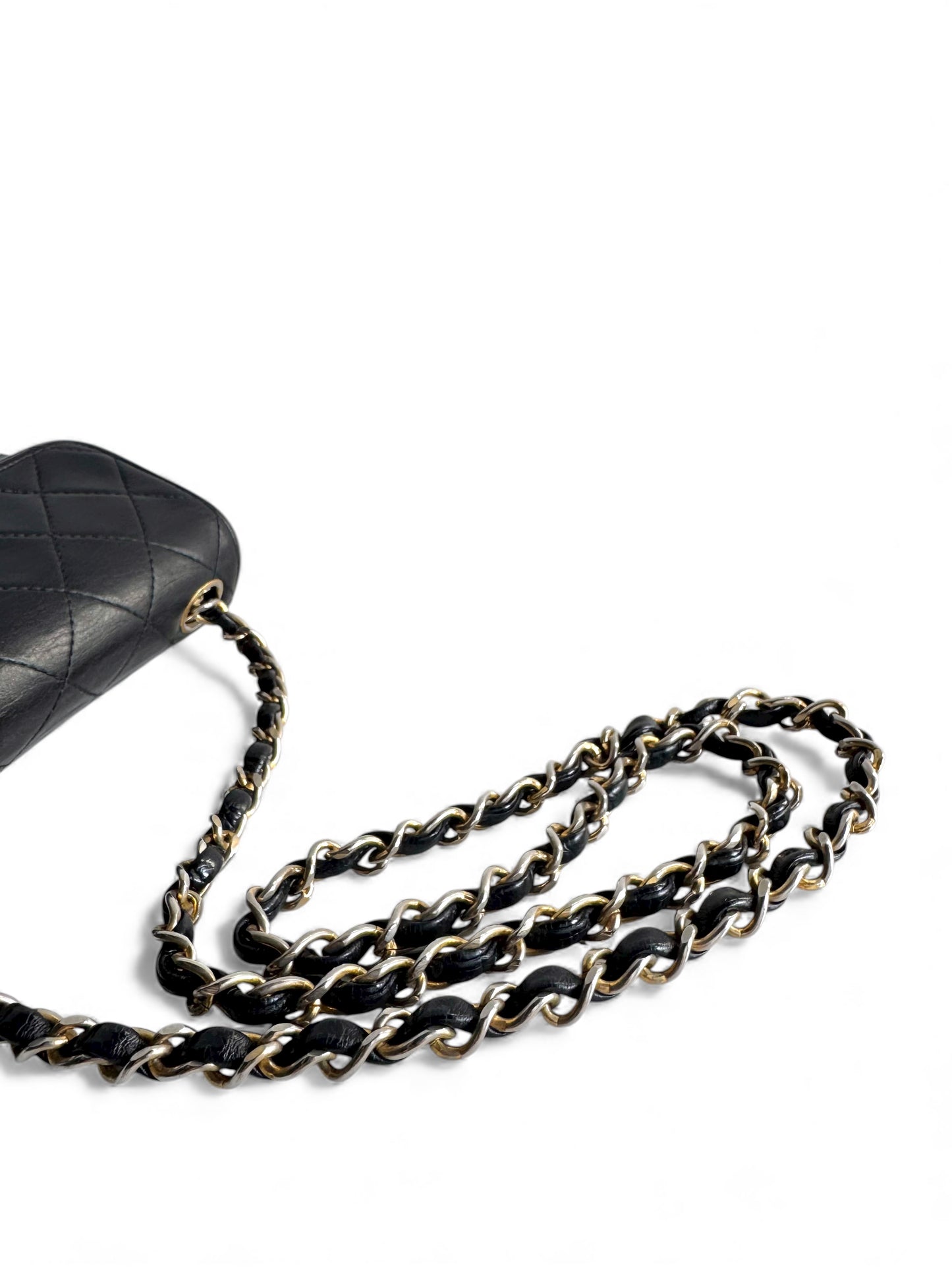 CHANEL Lambskin Matelasse Mini Flap Bag