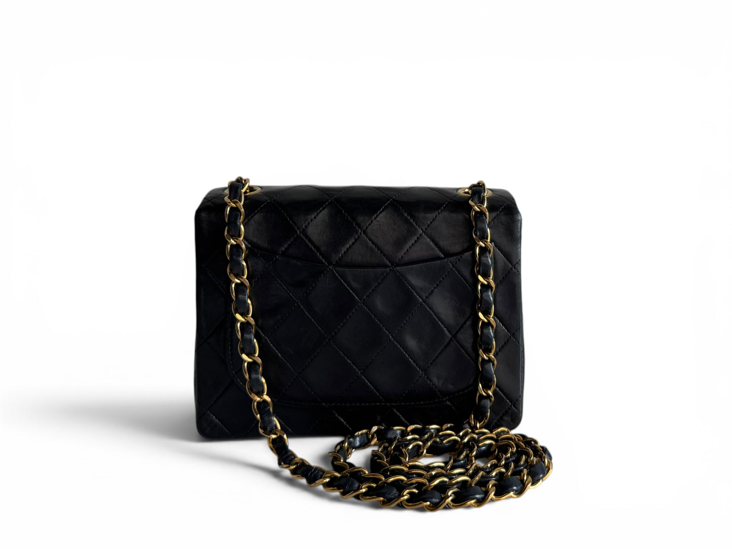 CHANEL Lambskin Quilted Mini Flap Bag