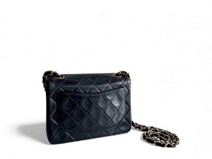 CHANEL Lambskin Matelasse Mini Flap Bag