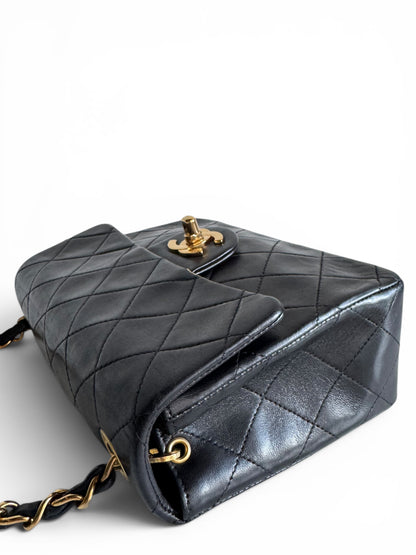 CHANEL Lambskin Quilted Mini Flap Bag