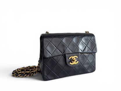 CHANEL Lambskin Quilted Mini Flap Bag