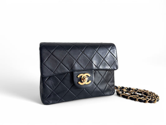 CHANEL Lambskin Quilted Mini Flap Bag