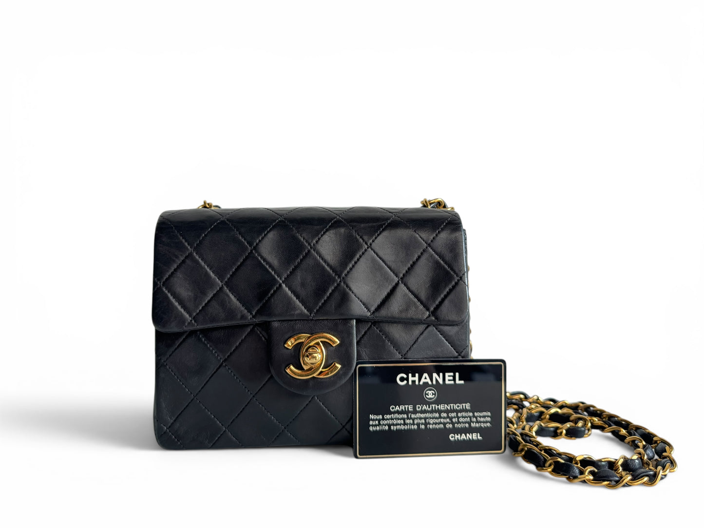 CHANEL Lambskin Quilted Mini Flap Bag