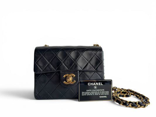 CHANEL Lambskin Quilted Mini Flap Bag