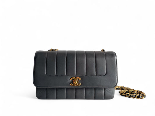 CHANEL Lambskin Vertical Flap Bag