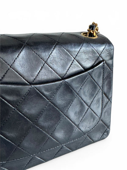 CHANEL Lambskin Quilted Mini Flap Bag