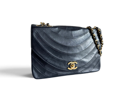 CHANEL Lambskin Half Moon Flap Bag