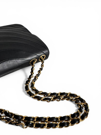 CHANEL Lambskin Half Moon Flap Bag