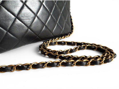 Chanel Lambskin Quilted Flap Camera Tassel Case