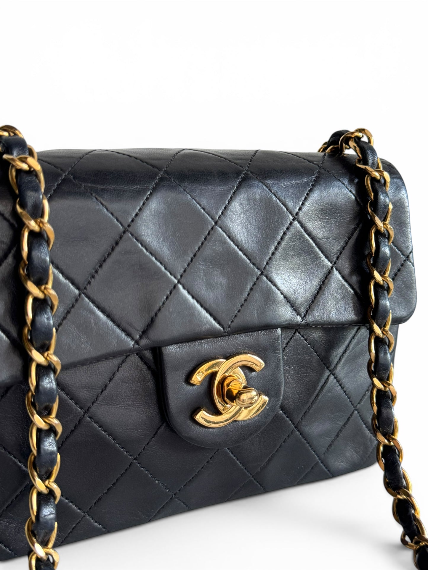 CHANEL Lambskin Quilted Mini Flap Bag