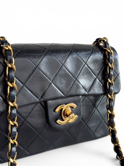 CHANEL Lambskin Quilted Mini Flap Bag