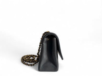 CHANEL Lambskin Vertical Flap Bag