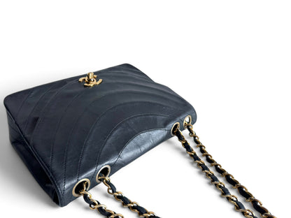 CHANEL Lambskin Half Moon Flap Bag