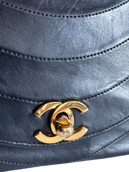 CHANEL Lambskin Half Moon Flap Bag