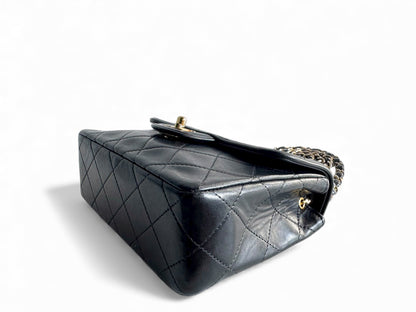 CHANEL Lambskin Matelasse Mini Flap Bag