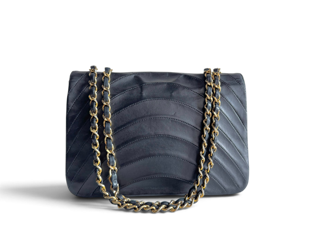 CHANEL Lambskin Half Moon Flap Bag