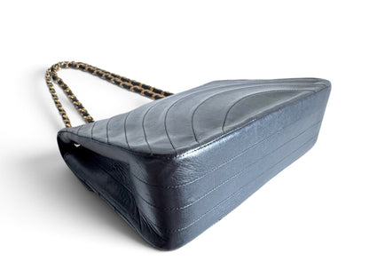CHANEL Lambskin Half Moon Flap Bag
