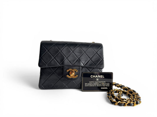 CHANEL Lambskin Quilted Mini Flap Bag