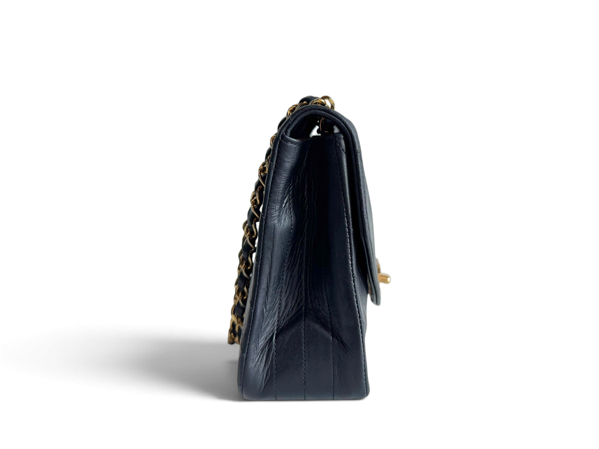 CHANEL Lambskin Half Moon Flap Bag