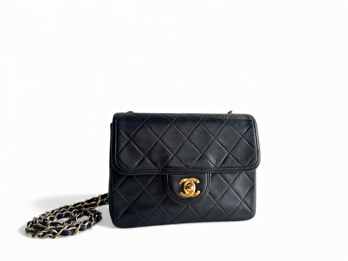 CHANEL Lambskin Matelasse Mini Flap Bag
