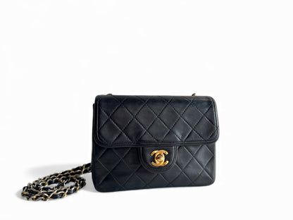 CHANEL Lambskin Matelasse Mini Flap Bag