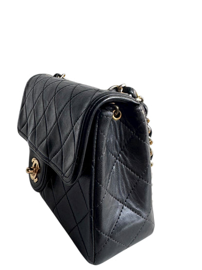 CHANEL Lambskin Matelasse Mini Flap Bag